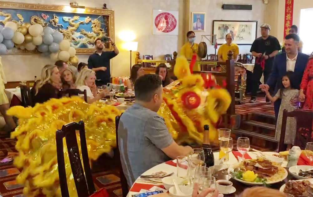 Lion dance celebration among guests at New Water Margin